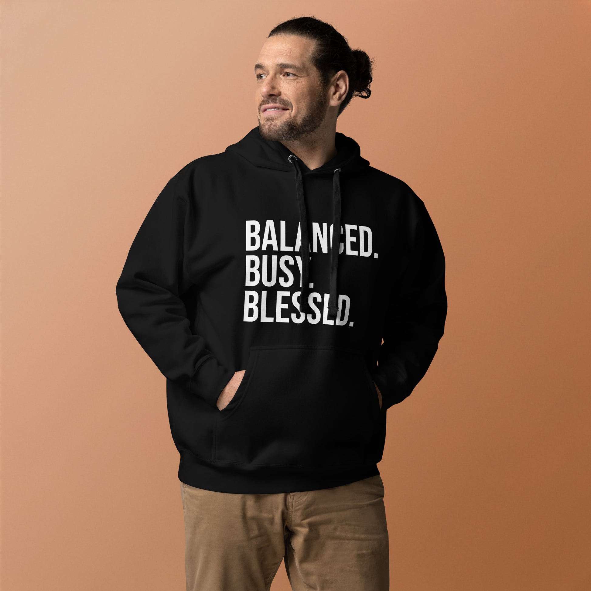 Unisex hoodie with ‘Balanced. Busy. Blessed.’ text design — WYVibe lifestyle hoodie
