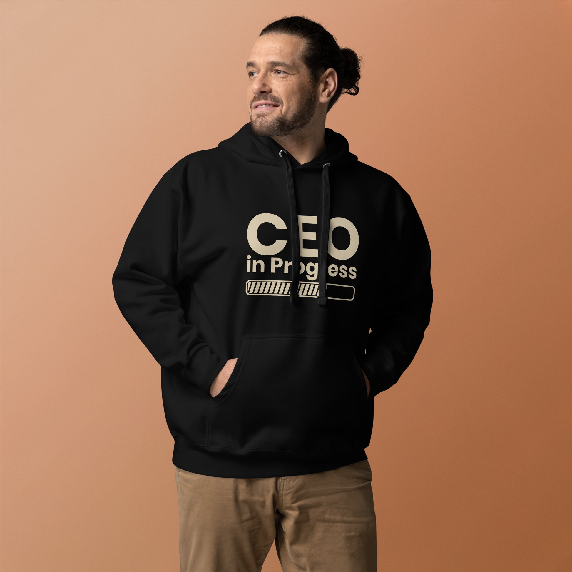 Unisex hoodie with ‘CEO in Progress’ text graphic — WYVibe entrepreneur streetwear hoodie.