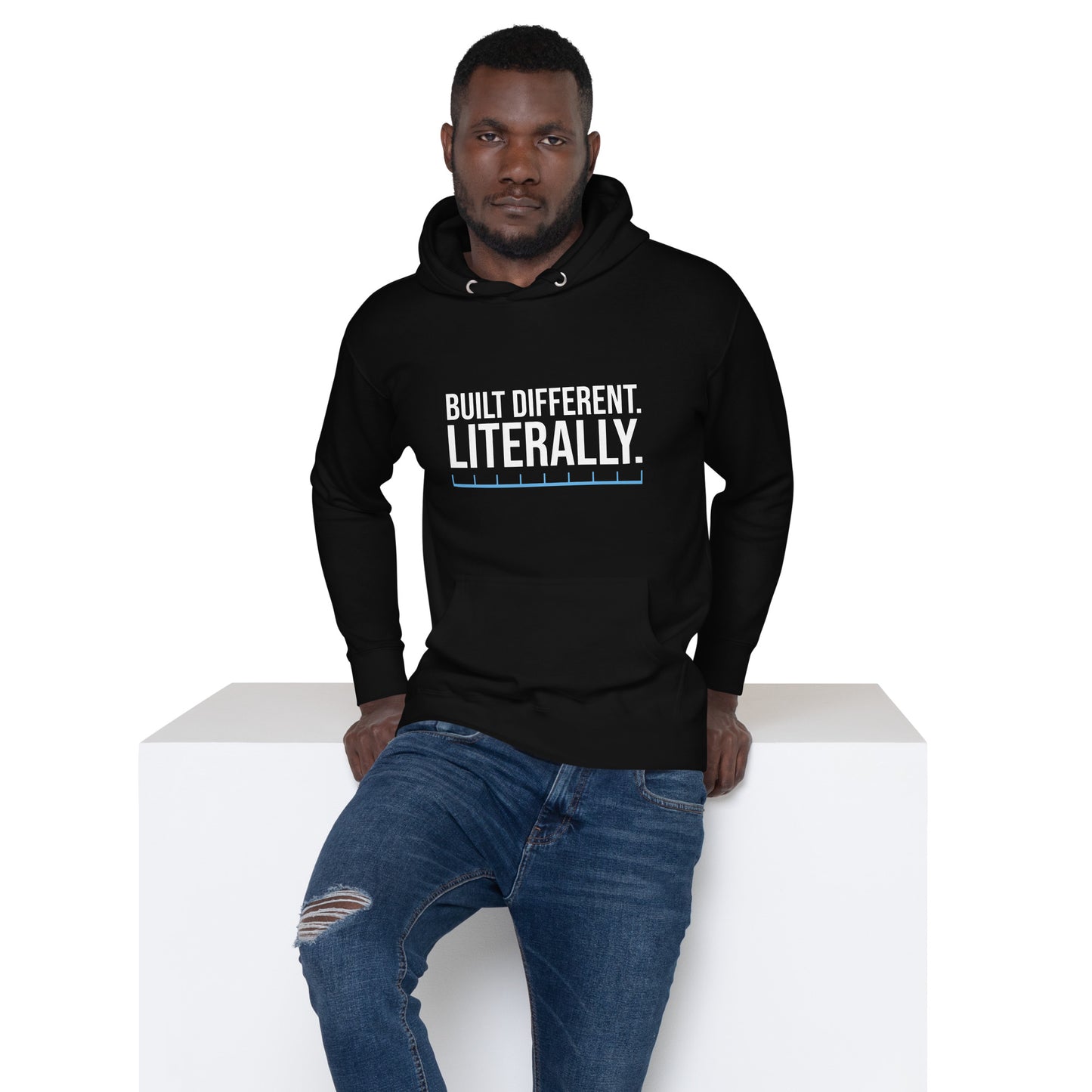 Unisex hoodie with ‘Built Different. Literally.’ text design — WYVibe motivational hoodie.