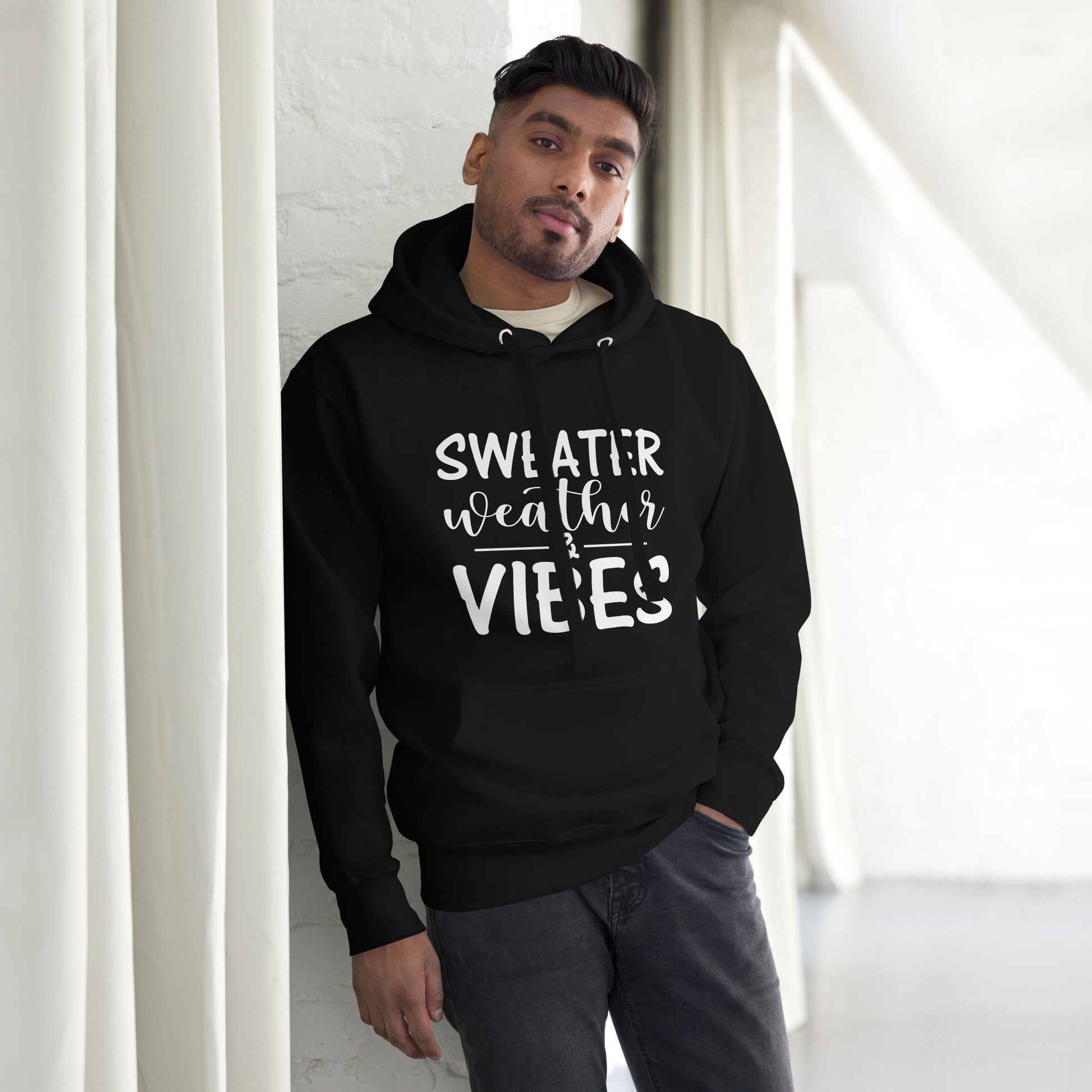 Unisex hoodie with ‘Sweater Weather & Vibes’ seasonal design — WYVibe cozy hoodie.