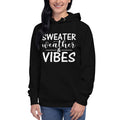 Unisex hoodie with ‘Sweater Weather & Vibes’ seasonal design — WYVibe cozy hoodie.