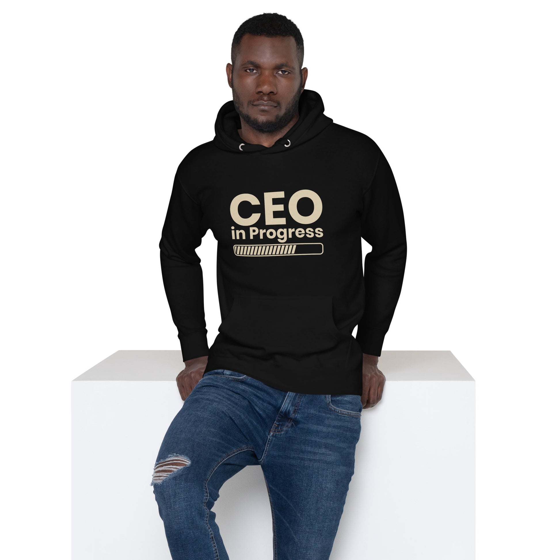 Unisex hoodie with ‘CEO in Progress’ text graphic — WYVibe entrepreneur streetwear hoodie.