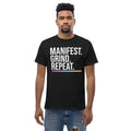 Unisex entrepreneurial t-shirt with ‘Manifest. Grind. Repeat.’ motivational design — WYVibe premium tee.