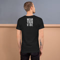 Unisex t-shirt with ‘Your Instructions Are: Wear Your Vibe’ design — WYVibe premium tee.
